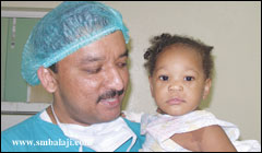 Dr Balaji with Cleft Baby